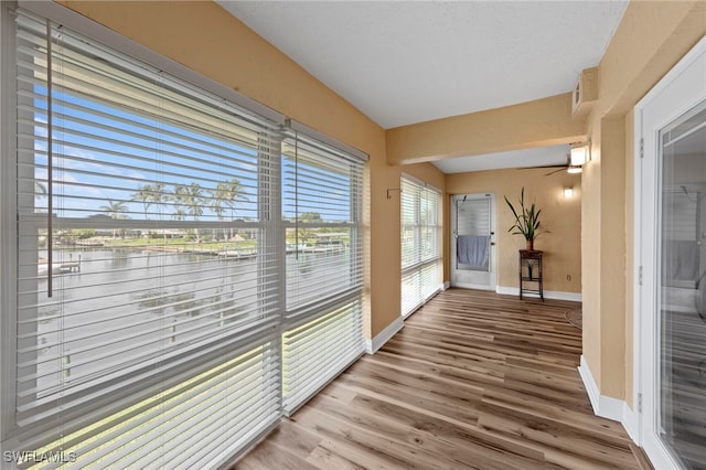 4938 Vincennes St Unit 3, Cape Coral, FL 33904 - hall featuring wood finished floors and a water view