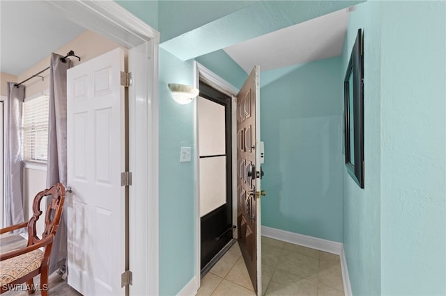 4938 Vincennes St Unit 3, Cape Coral, FL 33904 - hall with baseboards and light tile patterned floors