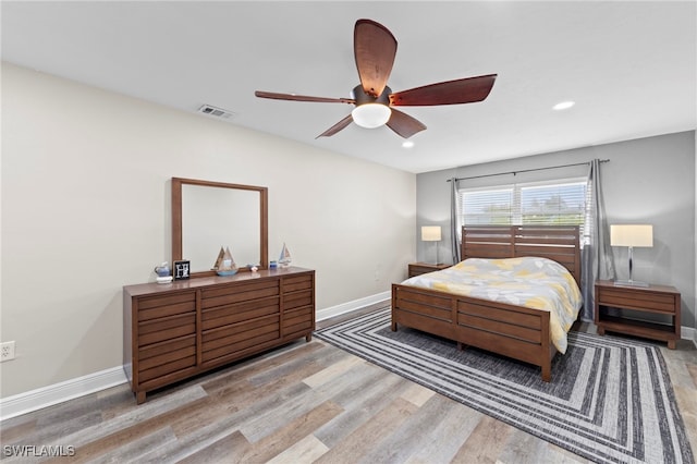 4938 Vincennes St Unit 3, Cape Coral, FL 33904 - bedroom with wood finished floors, recessed lighting, and a ceiling fan