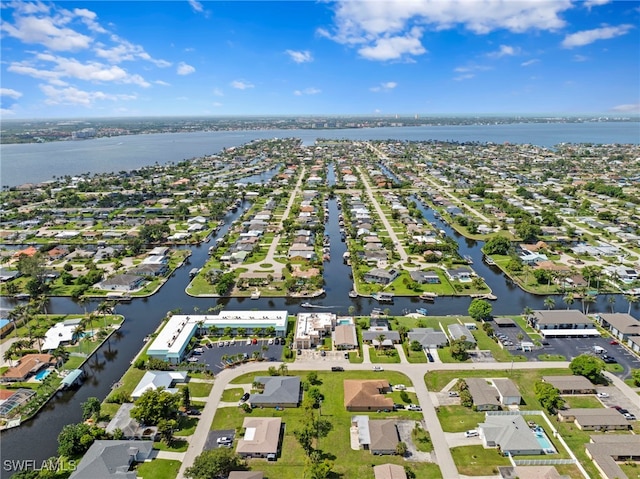 4938 Vincennes St Unit 3, Cape Coral, FL 33904 - aerial view of property and surrounding area with nearby suburban area and a large body of water