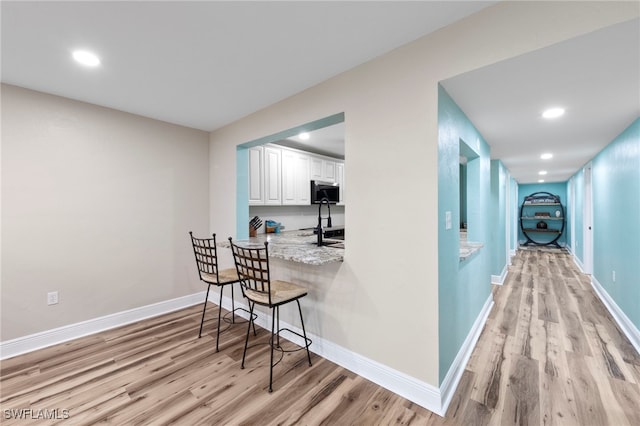4938 Vincennes St Unit 3, Cape Coral, FL 33904 - hall with light wood-type flooring and recessed lighting