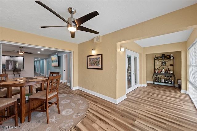 4938 Vincennes St Unit 3, Cape Coral, FL 33904 - dining space with a ceiling fan and light wood-style flooring