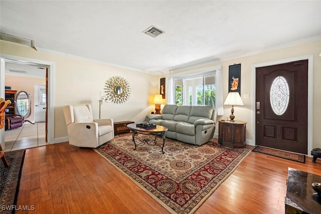 165 4th St, Bonita Springs, FL 34134 - living room featuring hardwood / wood-style floors and ornamental molding
