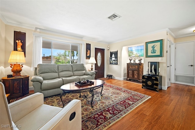 165 4th St, Bonita Springs, FL 34134 - living area featuring wood finished floors and ornamental molding