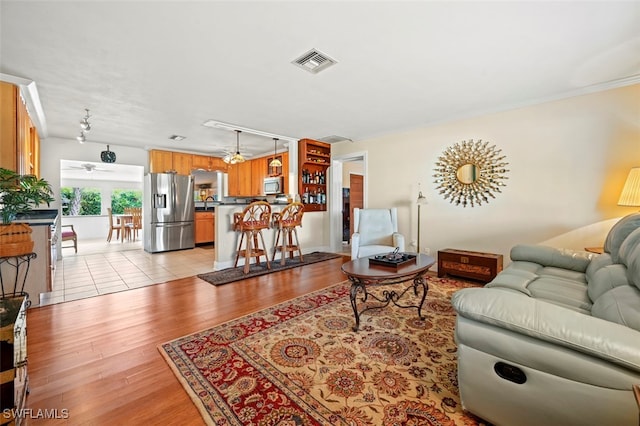 165 4th St, Bonita Springs, FL 34134 - living area featuring light wood-style floors