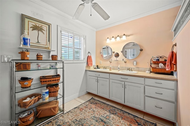 165 4th St, Bonita Springs, FL 34134 - bathroom featuring tile patterned floors, crown molding, double vanity, and a ceiling fan