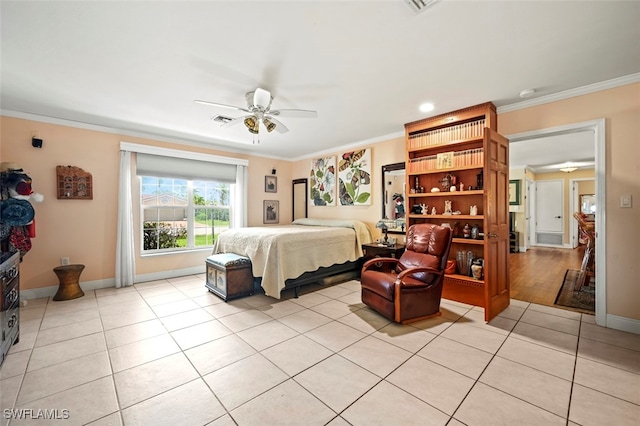 165 4th St, Bonita Springs, FL 34134 - bedroom with light tile patterned floors, crown molding, and a ceiling fan
