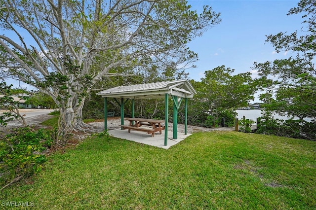 165 4th St, Bonita Springs, FL 34134 - view of green lawn featuring a gazebo and a water view