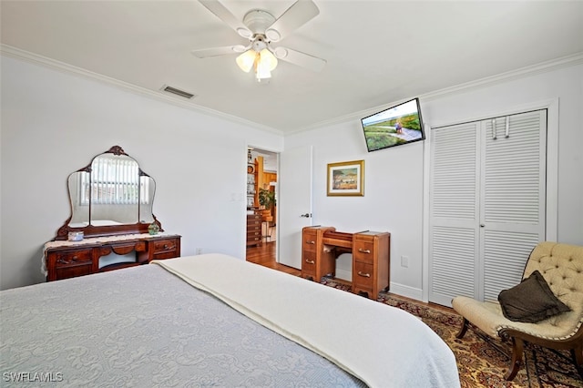 165 4th St, Bonita Springs, FL 34134 - bedroom with ornamental molding, a closet, and ceiling fan