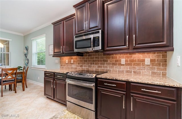 20551 Long Pond Rd, North Fort Myers, FL 33917 - kitchen with appliances with stainless steel finishes, tasteful backsplash, light stone countertops, dark brown cabinets, and ornamental molding