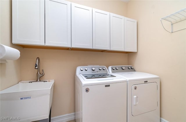 20551 Long Pond Rd, North Fort Myers, FL 33917 - washroom with cabinet space and washer and dryer