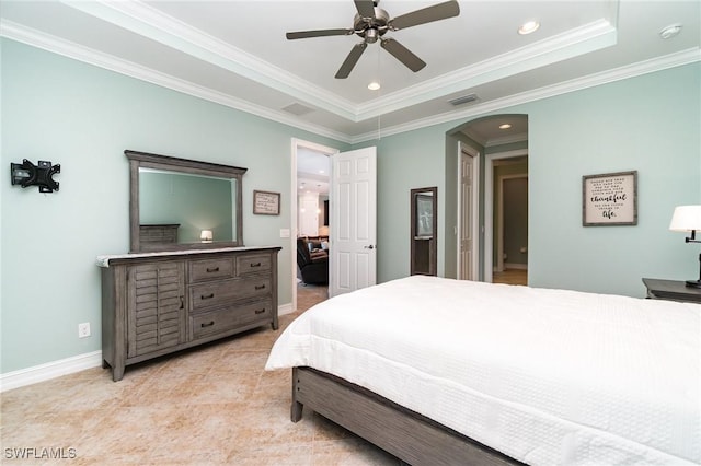 20551 Long Pond Rd, North Fort Myers, FL 33917 - bedroom featuring arched walkways, recessed lighting, crown molding, a tray ceiling, and light tile patterned flooring