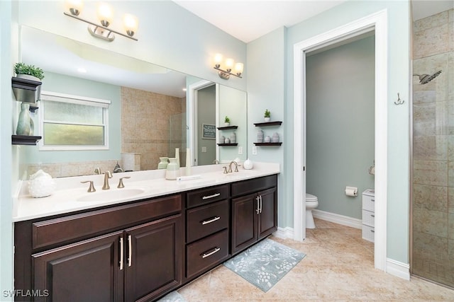 20551 Long Pond Rd, North Fort Myers, FL 33917 - bathroom with double vanity, tiled shower, and tile patterned floors