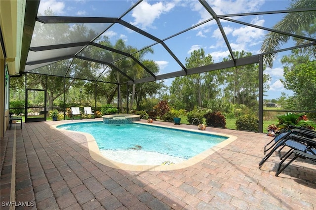 20551 Long Pond Rd, North Fort Myers, FL 33917 - view of swimming pool with a patio area, a pool with connected hot tub, and glass enclosure