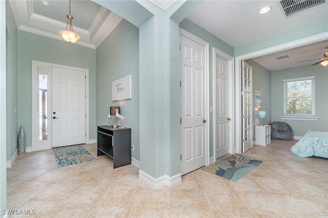20551 Long Pond Rd, North Fort Myers, FL 33917 - foyer entrance featuring crown molding, tile patterned floors, arched walkways, and a ceiling fan