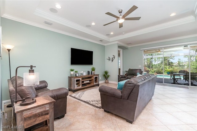 20551 Long Pond Rd, North Fort Myers, FL 33917 - living area with ceiling fan, light tile patterned floors, crown molding, and a raised ceiling