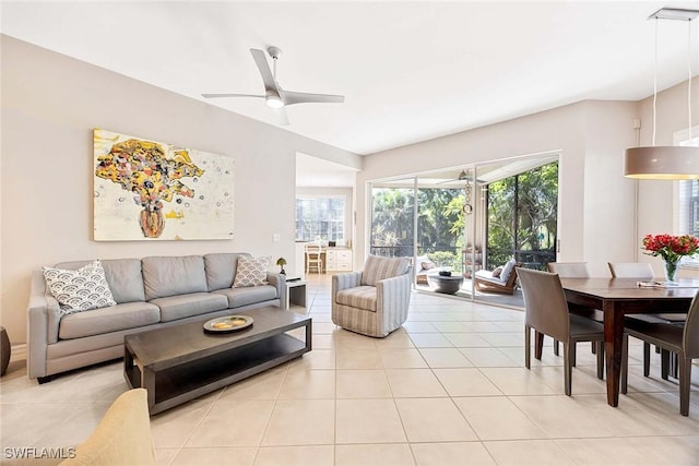 24400 Reserve Ct Unit 103, Bonita Springs, FL 34134 - living area featuring a ceiling fan and light tile patterned flooring
