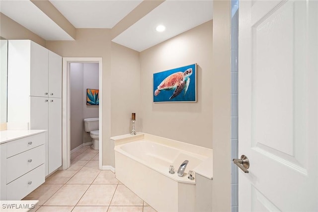 24400 Reserve Ct Unit 103, Bonita Springs, FL 34134 - full bath with a garden tub, tile patterned floors, and vanity