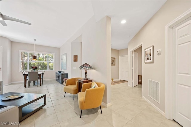 24400 Reserve Ct Unit 103, Bonita Springs, FL 34134 - living room featuring light tile patterned floors, ceiling fan, and recessed lighting