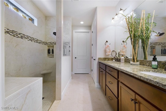 14274 Arrow Point Ct, Estero, FL 33928 - bathroom with double vanity, a walk in shower, and recessed lighting
