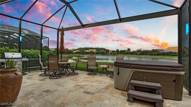 14274 Arrow Point Ct, Estero, FL 33928 - view of patio with a hot tub, grilling area, a water view, outdoor dining space, and glass enclosure