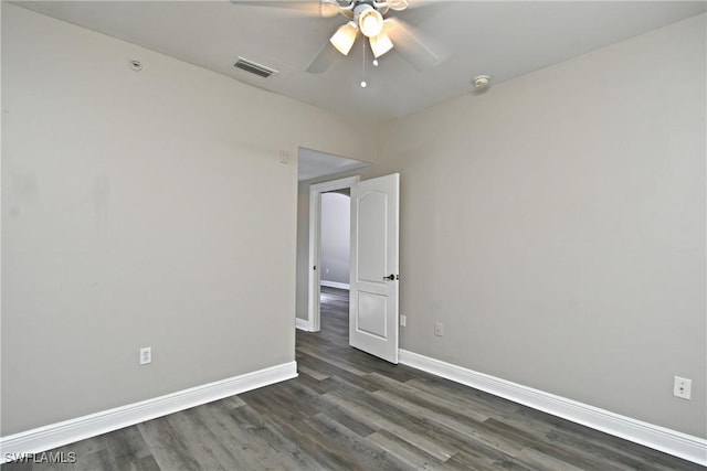 4154 Castilla Cir Unit 204, Fort Myers, FL 33916 - spare room with ceiling fan, dark wood-style flooring, and a smoke detector