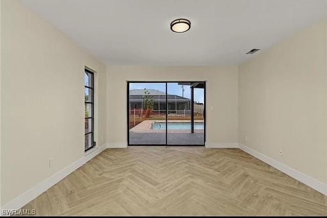 813 SW 52nd St, Cape Coral, FL 33914 - unfurnished room with baseboards