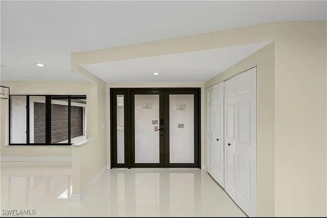 813 SW 52nd St, Cape Coral, FL 33914 - foyer with recessed lighting and french doors
