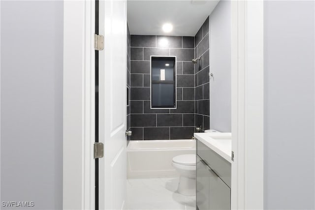 2714 2nd St SW, Lehigh Acres, FL 33976 - bathroom with vanity, bathtub / shower combination, and marble finish floors