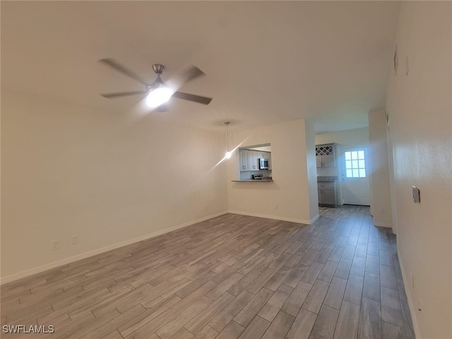 8313 Bernwood Cove Loop Unit 1211, Fort Myers, FL 33966 - spare room featuring wood finished floors and ceiling fan