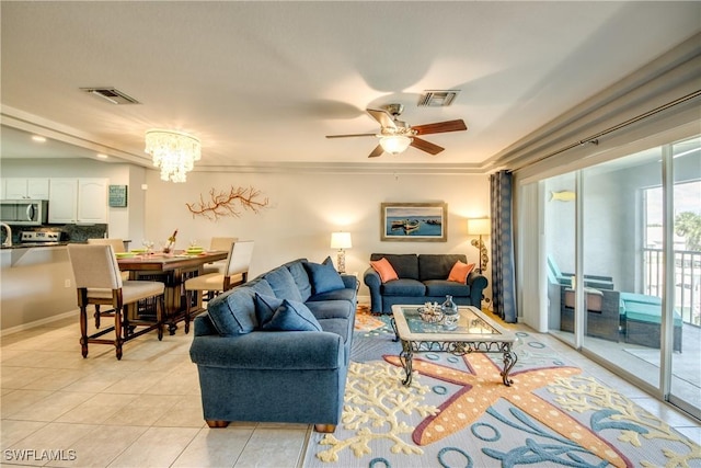 841 SW 47th Ter Unit 206, Cape Coral, FL 33914 - living area with light tile patterned flooring, a chandelier, and a ceiling fan