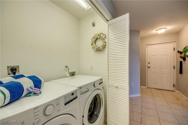 841 SW 47th Ter Unit 206, Cape Coral, FL 33914 - laundry room featuring independent washer and dryer and light tile patterned floors