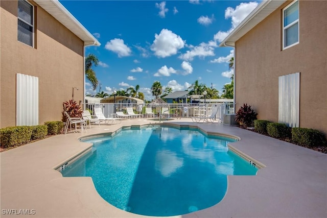 841 SW 47th Ter Unit 206, Cape Coral, FL 33914 - community pool featuring a patio area