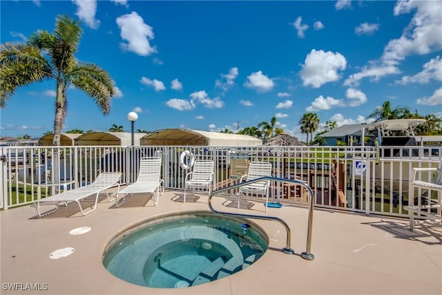 841 SW 47th Ter Unit 206, Cape Coral, FL 33914 - view of pool with a patio and a hot tub