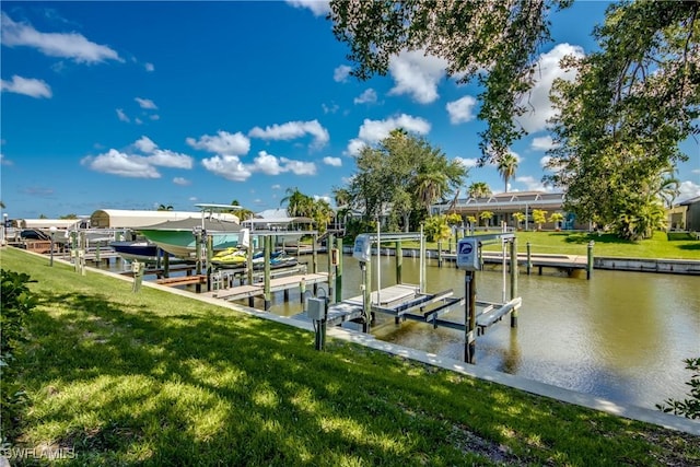 841 SW 47th Ter Unit 206, Cape Coral, FL 33914 - dock area featuring boat lift, a water view, and a yard