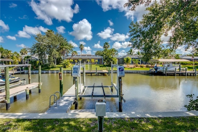 841 SW 47th Ter Unit 206, Cape Coral, FL 33914 - dock featuring boat lift and a water view