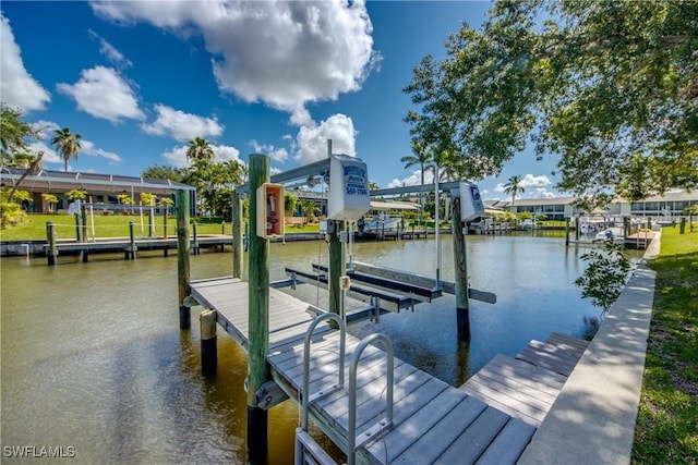 841 SW 47th Ter Unit 206, Cape Coral, FL 33914 - dock area featuring boat lift and a water view