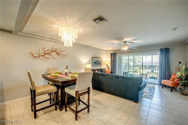 841 SW 47th Ter Unit 206, Cape Coral, FL 33914 - dining space with a ceiling fan, a chandelier, light tile patterned floors, and crown molding