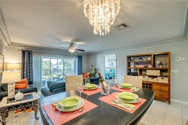 841 SW 47th Ter Unit 206, Cape Coral, FL 33914 - dining room featuring light tile patterned flooring, a chandelier, and a ceiling fan