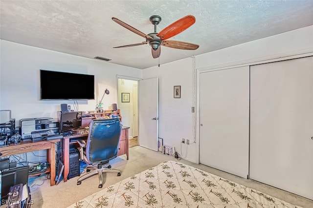5554 Hamlet Ln, Fort Myers, FL 33919 - office area with a ceiling fan, carpet, and a textured ceiling