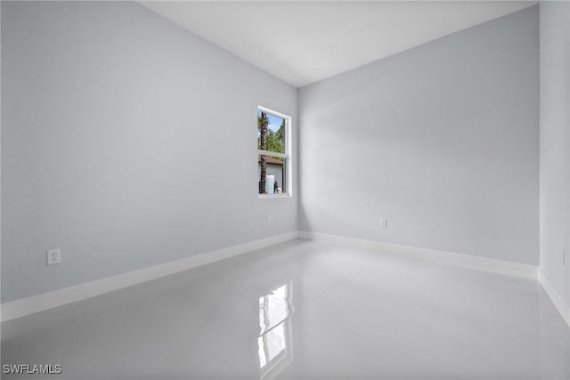 3990 27th Ave NE, Naples, FL 34120 - unfurnished room with baseboards and tile patterned flooring