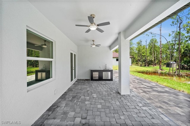 3990 27th Ave NE, Naples, FL 34120 - view of patio / terrace featuring ceiling fan and a sink