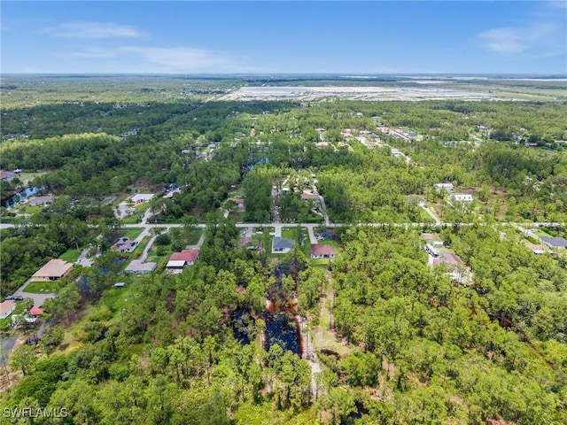 3990 27th Ave NE, Naples, FL 34120 - view of property location featuring a forest