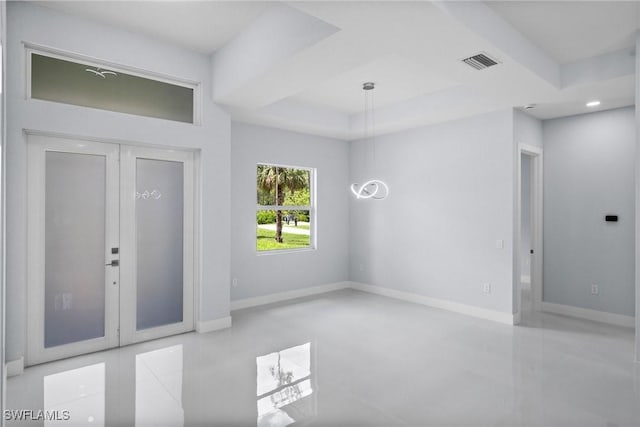 3990 27th Ave NE, Naples, FL 34120 - foyer entrance featuring recessed lighting and concrete flooring
