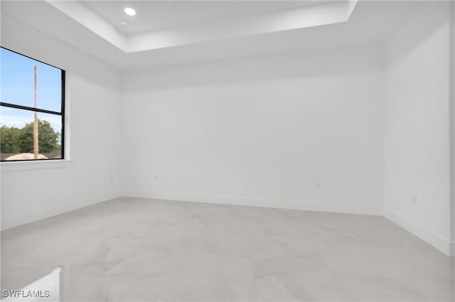 1018 Calvin Ave, Lehigh Acres, FL 33972 - spare room with a raised ceiling and recessed lighting