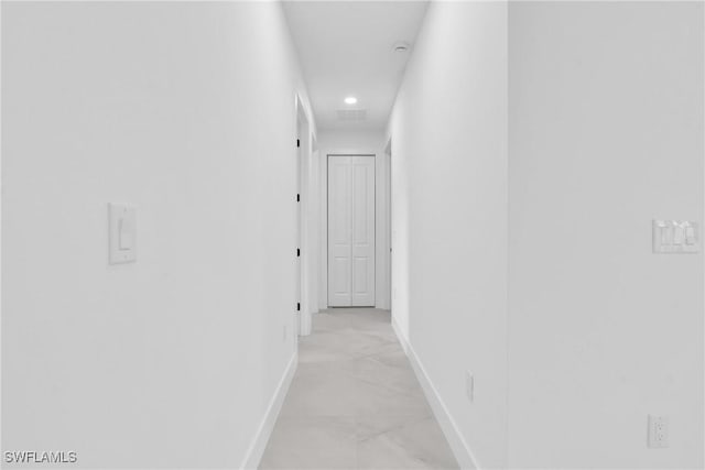 1018 Calvin Ave, Lehigh Acres, FL 33972 - hallway with recessed lighting and light marble finish flooring