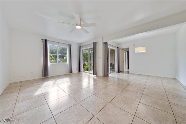 2810 Citrus Lake Dr Unit U101, Naples, FL 34109 - unfurnished room with ceiling fan and light tile patterned floors