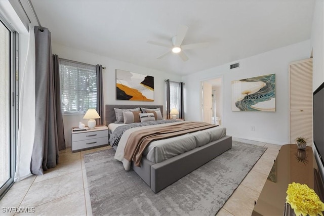 2810 Citrus Lake Dr Unit U101, Naples, FL 34109 - bedroom with light tile patterned floors, multiple windows, and ceiling fan