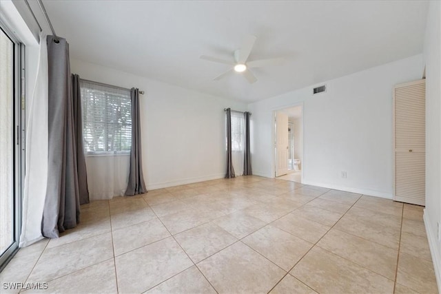 2810 Citrus Lake Dr Unit U101, Naples, FL 34109 - empty room featuring ceiling fan and light tile patterned floors