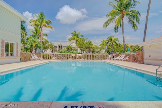 1763 Four Mile Cove Pkwy Unit 611, Cape Coral, FL 33990 - community pool featuring a patio area
